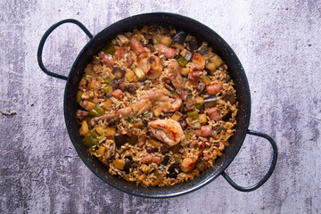 Rabbit and sausage paella. Typical Spanish paella tapa recipe with meat.
