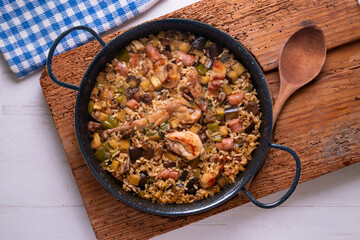 Rabbit and sausage paella. Typical Spanish paella tapa recipe with meat.