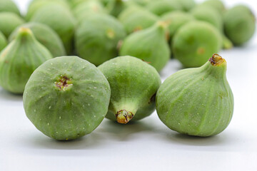 green figs on a white background
