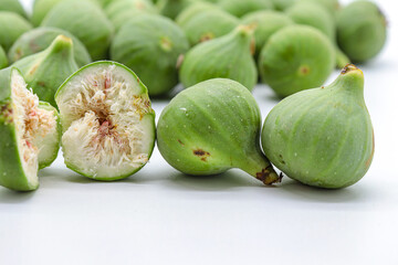green figs on a white background
