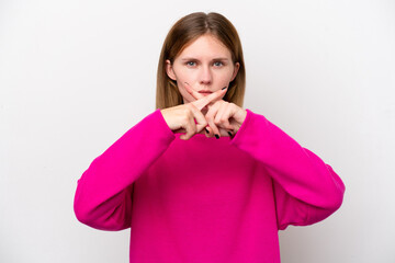 Young English woman isolated on white background showing a sign of silence gesture