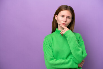 Young English woman isolated on purple background thinking
