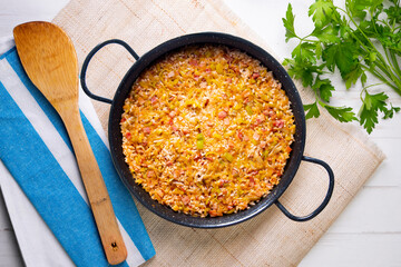 Paella bacon and leeks. Traditional Spanish paella tapa recipe.