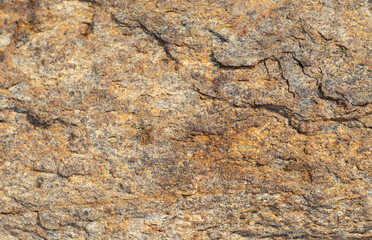 The texture of the stone. Rock. Granite. Stone mining. Stone surface. Mining industry.