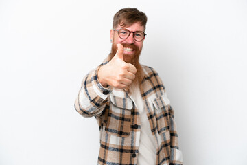 Redhead man with long beard isolated on white background with thumbs up because something good has happened