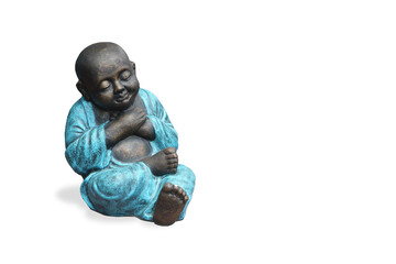 Little buddha or monk in blue clothes with arms crossed on his chest Isolated on a white background.