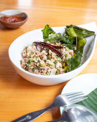 Thai north-eastern authentic spicy minced pork salad