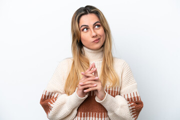 Young caucasian woman isolated on white background scheming something