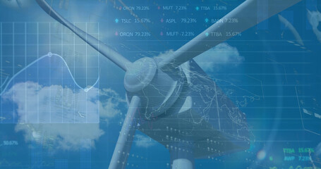 Image of financial data processing over wind turbine