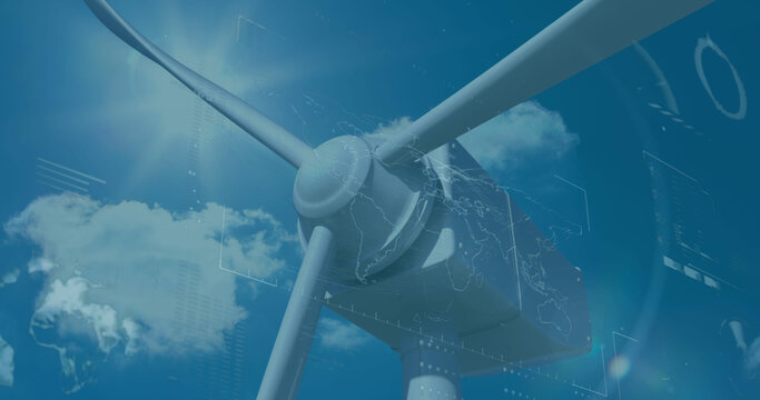 Image of financial data processing over wind turbine