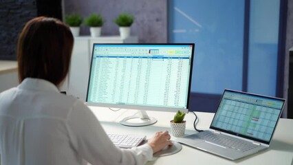 Data Analyst Woman Using Spreadsheet - Powered by Adobe