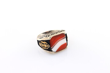  men's ring with embroideries or patterns on a white background