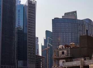 Fototapeta na wymiar Dubai, UAE - 09.29.2022 - Modern buildings in Business Bay district. City