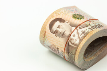 roll of money Thai baht  1,000 bill 