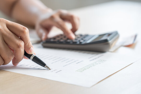 Woman calculate bill budget payment, home accounting concept with calculator