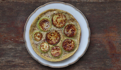 Delicious omelet with zucchini squash.