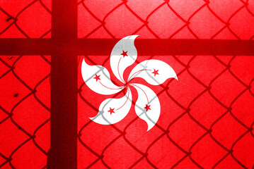 Backlight Backlight with actual Hong Kong flag and barbed wire. Prison concept with border image....