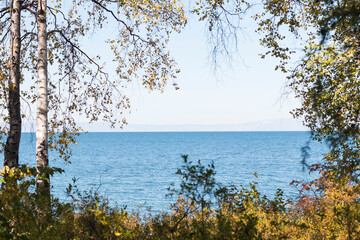 Obraz premium lake Baikal in the forest in summer and autumn