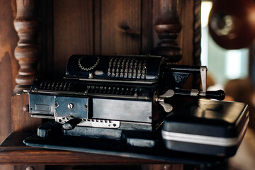Fototapeta na wymiar Ancient iron calculator, old calculator, vintage, mathematic, retro machine