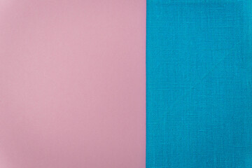 Fototapeta premium Blue napkin on light purple background with copy space