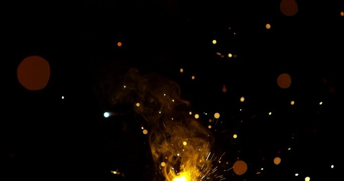 Super Slow Motion Of Sparks From Welding On Black Background. Filmed on high speed cinema camera, 1000 fps.