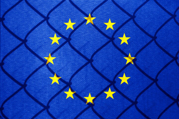 Backlight Backlight with actual EU flag and barbed wire. Prison concept with border image. Double...