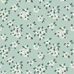 Seamless floral pattern, cute ditsy print with small drawing plants in rustic style. Abstract botanical arrangement of little decorative flowers, leaves on a light blue background. Vector illustration