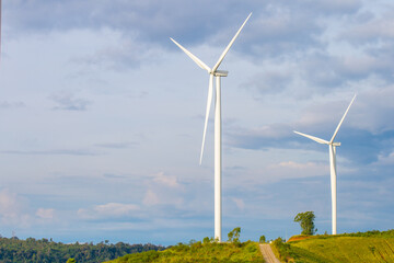 Fototapeta premium Wind farms for generating electricity, a clean alternative energy that does not cause pollution and negatively affect the global climate change.