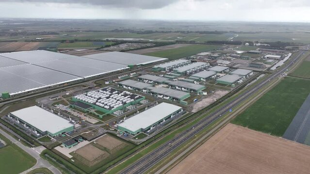 Datacenter building complex computing center in Hollands Kroon. Data technology ICT equipment building housing like servers. Building facility communication tech.
