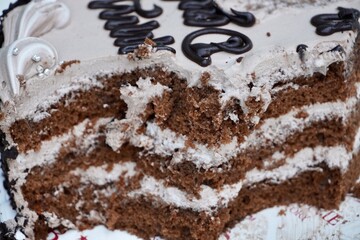 Chocolate flakes cake cuts for birthday celebration. Brownie Ice-cream cake for birthday function. Cut portions of Ice cream cake closeup view.