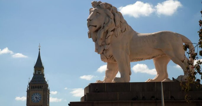 Big Ben, Houses of Parliament and the Lion Statue on Westminster Bridge, London, England