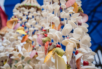 Handmade souvenir decorated with different sea shells