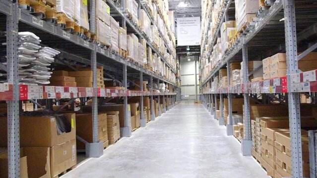 Antalya, Turkey September 2022. Warehouse aisle in an IKEA store with goods and boxes on shelves