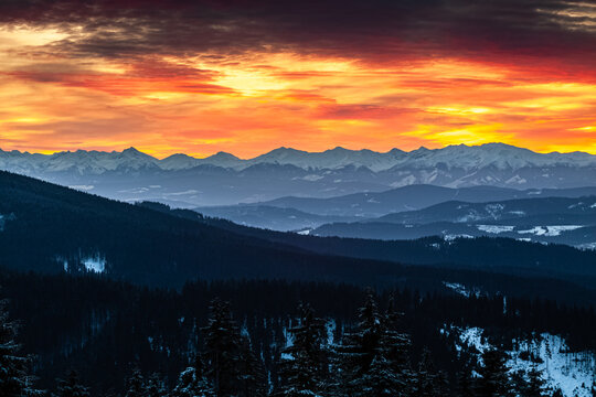 Fototapeta wschód słońca góry zima