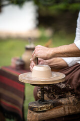 a potter makes a jug