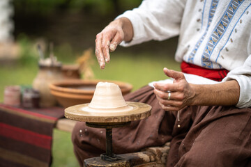 a potter makes a jug