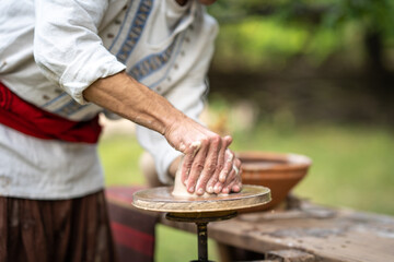 a potter makes a jug