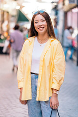 Happy Asian Woman in the City