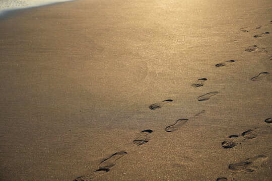 footprints on the beach