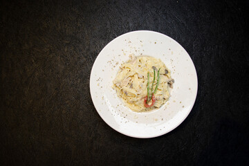 Isolated pasta with alfredo sauce