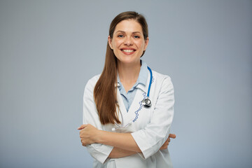 Smiling doctor woman in medical uniform. Isolated portrait of female medical worker.