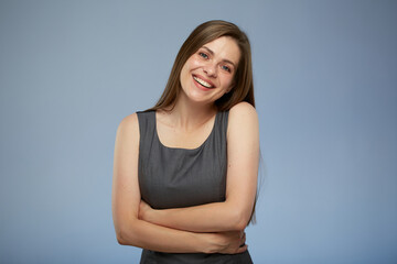 Fototapeta premium Smiling happy business woman holding hands on stomach.