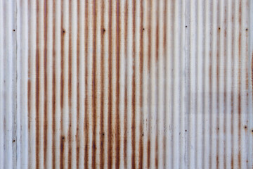 錆びた鉄板の古い壁