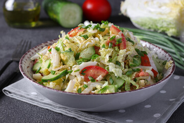Salad with Chinese cabbage, tomatoes, chives, eggs and cucumber, dressed with olive oil, Close-up