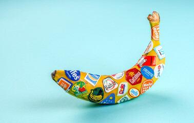 Banana fruit in creative concept of travel. Colorful and funny travel idea background.