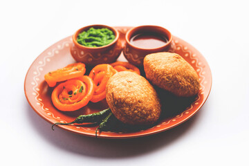 Kachori with Jalebi, snack combination from India also called kachauri, kachodi, katchuri, imarti