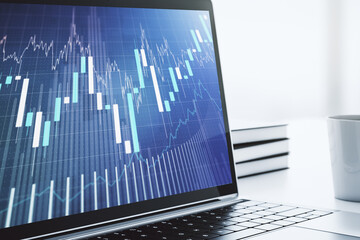 Abstract creative financial graph on modern laptop screen, forex and investment concept. 3D Rendering