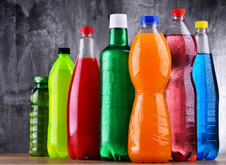 Plastic bottles of assorted carbonated soft drinks