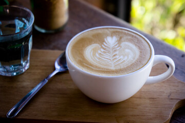 coffee aroma white cup on wood table in the morning time