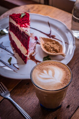 coffee cappucino cup and cake on wood table classic style in coffee shop